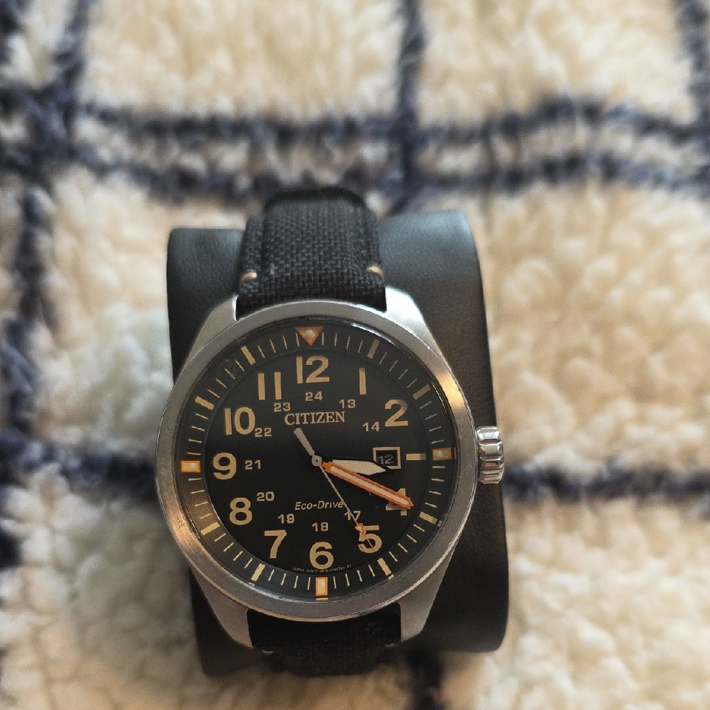 Citizen Eco-Drive Black and Silver Watch with Orange Accents